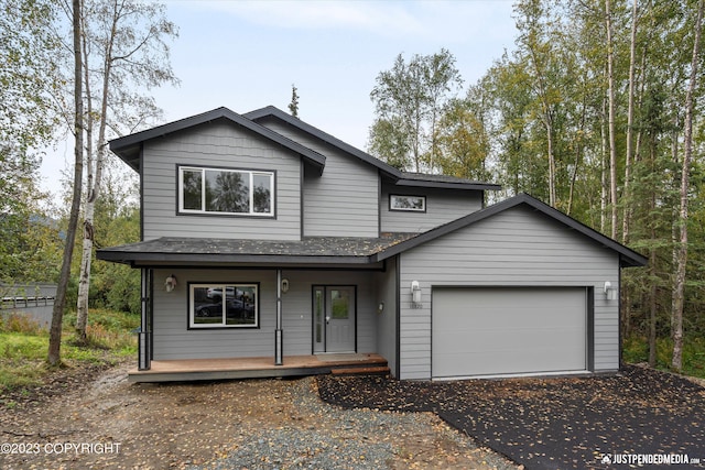 front facade with a garage