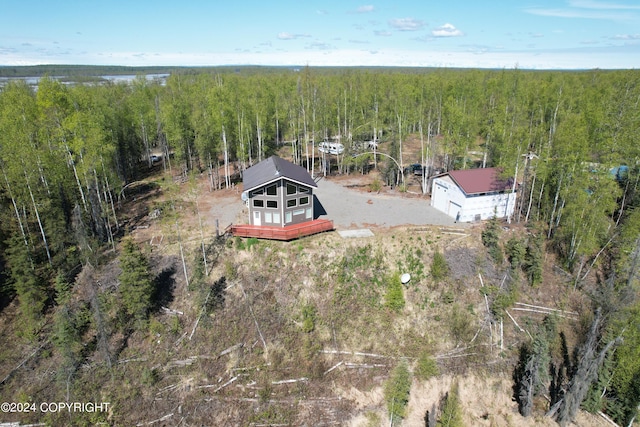 bird's eye view featuring a view of trees