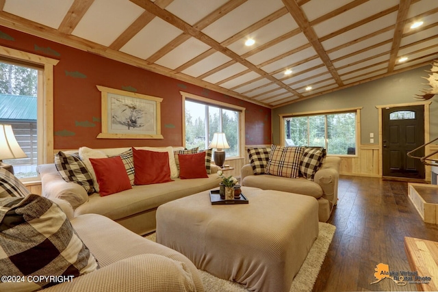 living room with lofted ceiling, dark wood-style flooring, and wainscoting