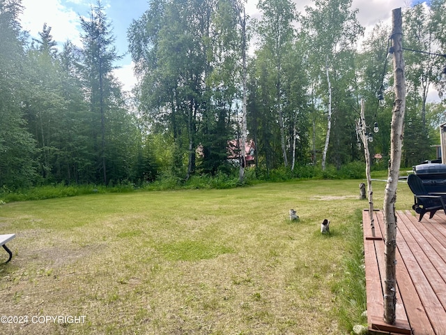 view of yard featuring a deck