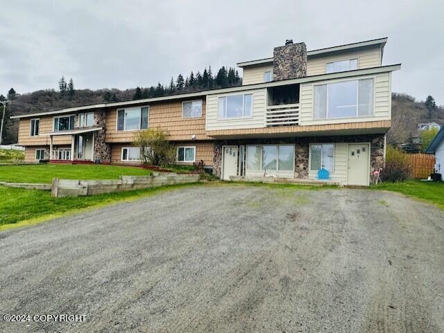 view of front of house with a front lawn