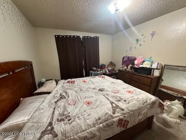 bedroom with a textured ceiling