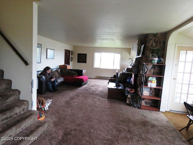 living room featuring a baseboard radiator and carpet floors