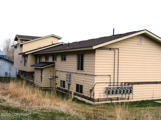 106 E Bayview Ave, Homer, AK 99603 - back of property with a shingled roof