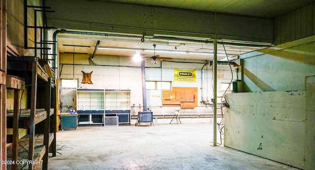 basement featuring ceiling fan