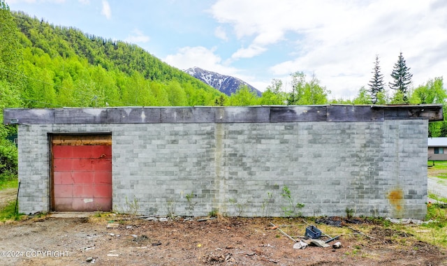 exterior space featuring a mountain view