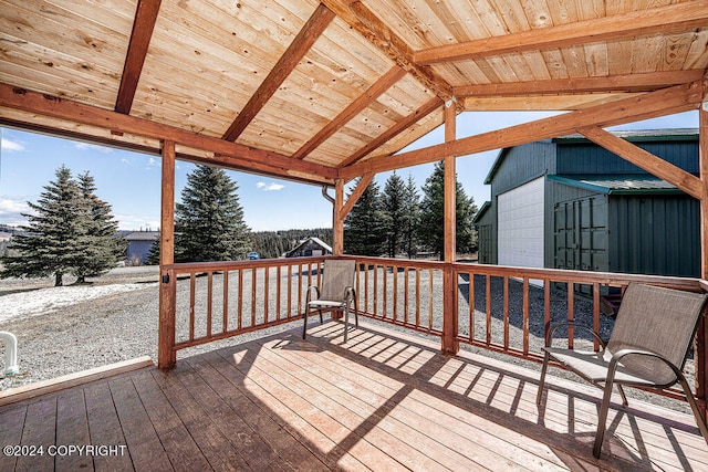 deck featuring an outdoor structure