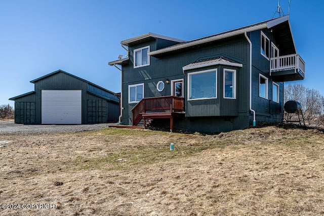 exterior space with an outdoor structure and a garage