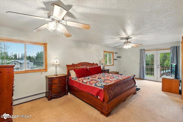 44775 Carver Dr, Kenai, AK 99611 - bedroom with baseboard heating, access to exterior, carpet floors, a textured ceiling, and french doors