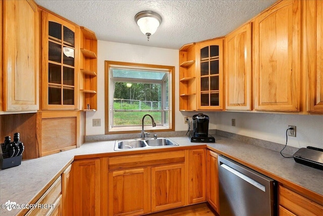 44775 Carver Dr, Kenai, AK 99611 - kitchen with dishwasher, a sink, open shelves, a textured ceiling, and glass insert cabinets