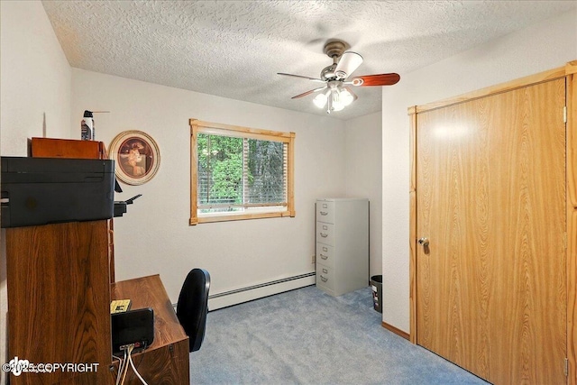 44775 Carver Dr, Kenai, AK 99611 - carpeted home office with baseboard heating, ceiling fan, and a textured ceiling
