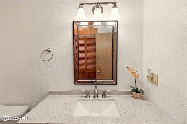 44775 Carver Dr, Kenai, AK 99611 - half bathroom featuring vanity and toilet