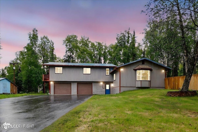 44775 Carver Dr, Kenai, AK 99611 - view of front of house with asphalt driveway and a garage