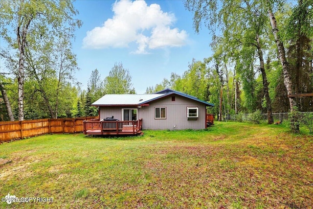 44775 Carver Dr, Kenai, AK 99611 - back of property featuring a deck