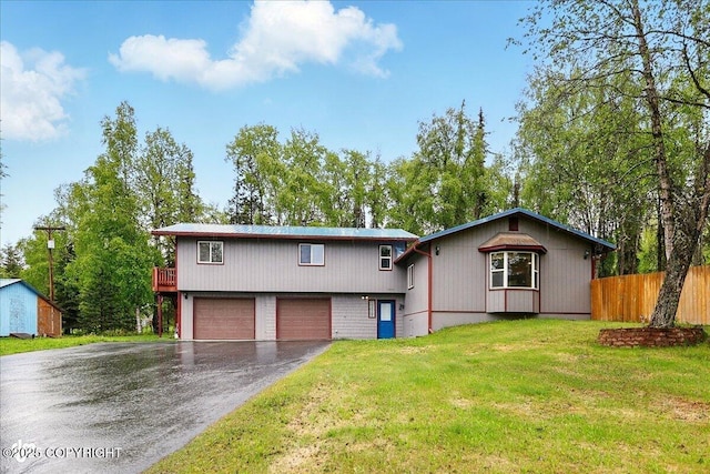 44775 Carver Dr, Kenai, AK 99611 - view of front of home with asphalt driveway and a garage