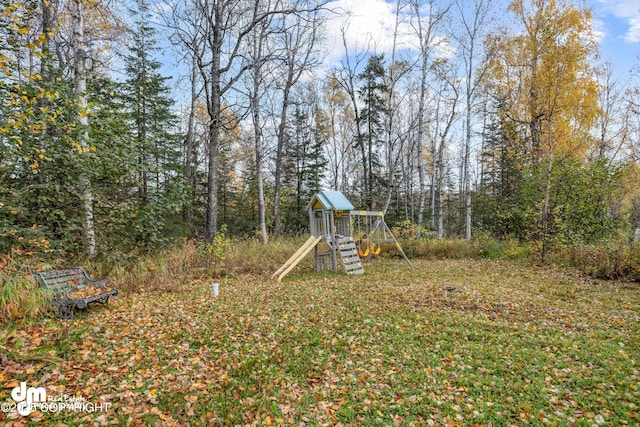 view of yard with a playground