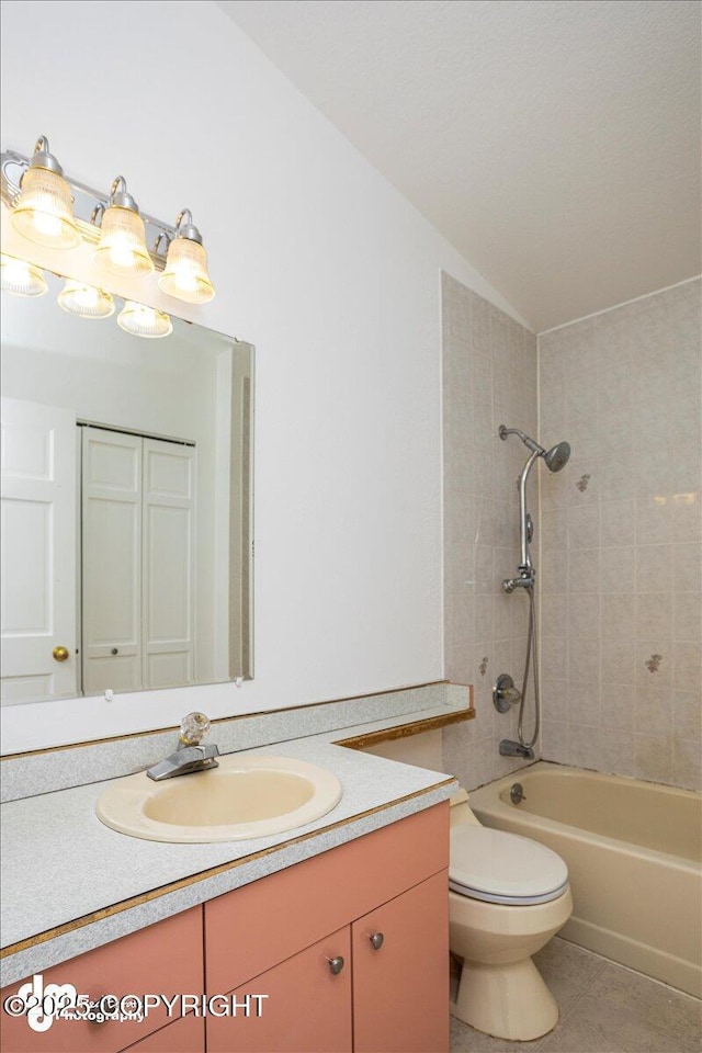 full bath featuring shower / bathtub combination, toilet, vanity, a closet, and tile patterned floors