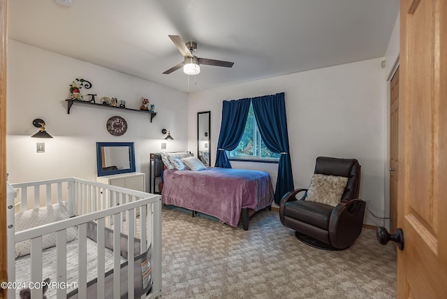 carpeted bedroom with ceiling fan