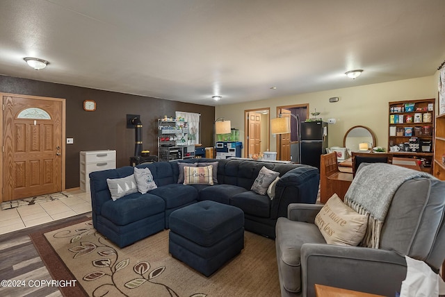 living room with light tile patterned floors