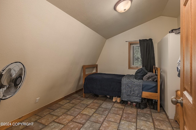 bedroom with vaulted ceiling