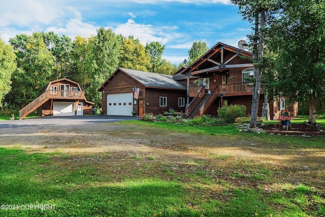 log home featuring a front yard