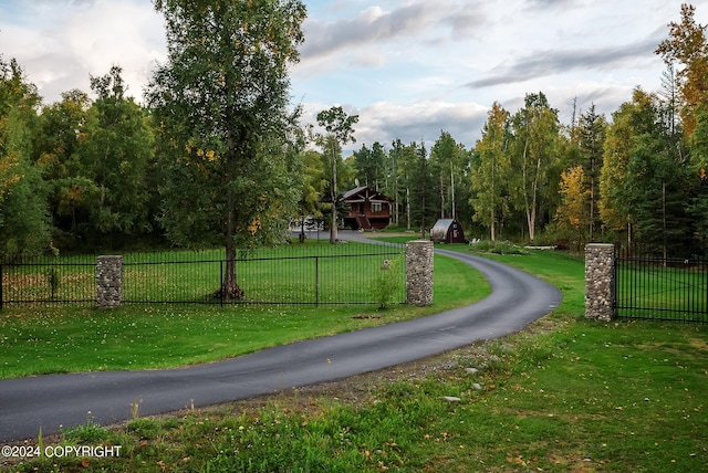 surrounding community featuring a yard