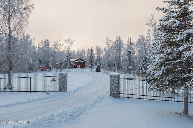 view of snow covered gate