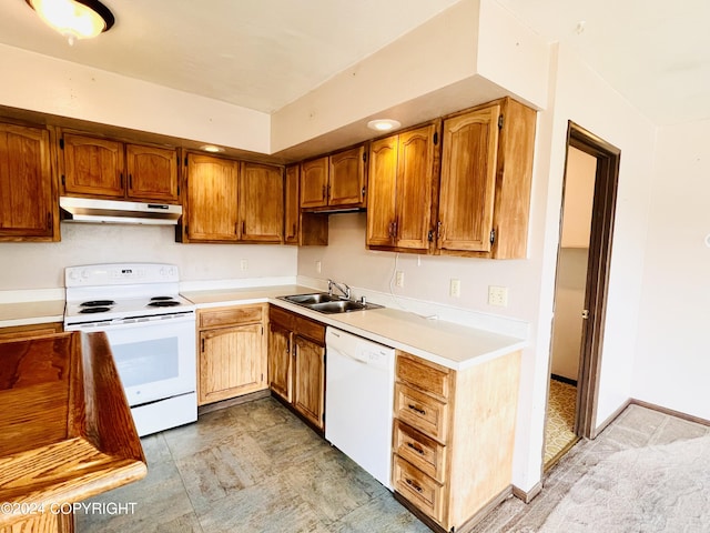 kitchen with white appliances, sink, and light tile floors