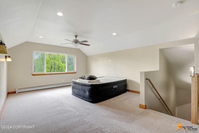 bedroom featuring lofted ceiling, light carpet, ceiling fan, and baseboard heating