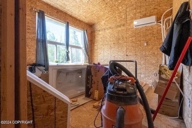 storage room with an AC wall unit