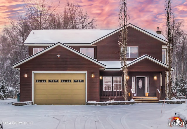 view of front of home with a garage