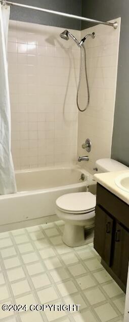 full bathroom with vanity, shower / bathtub combination with curtain, and toilet