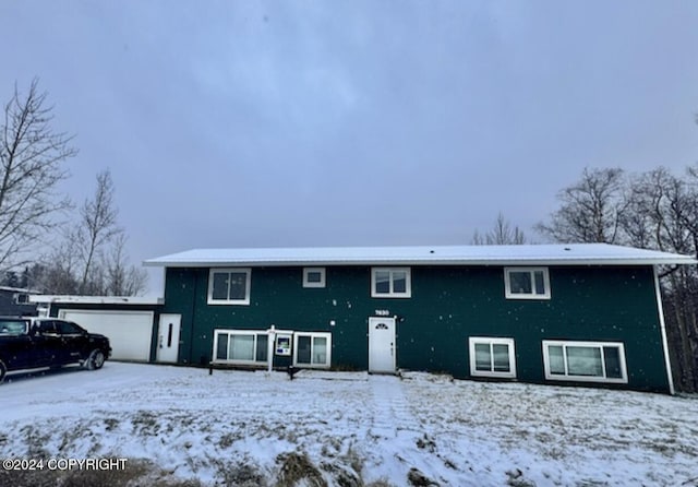 view of snow covered property