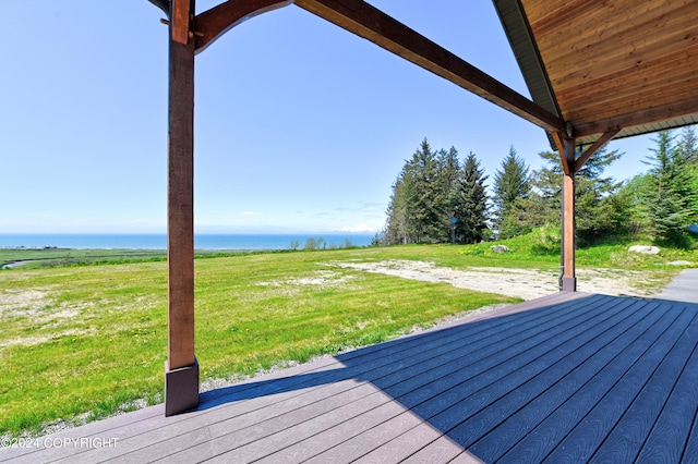 deck featuring a yard and a water view