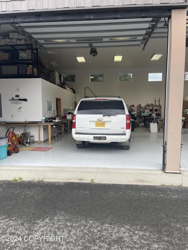 garage featuring a garage door opener