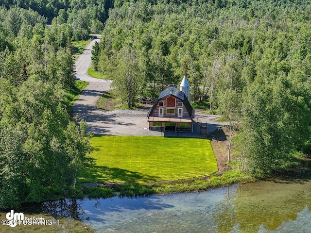 drone / aerial view with a water view