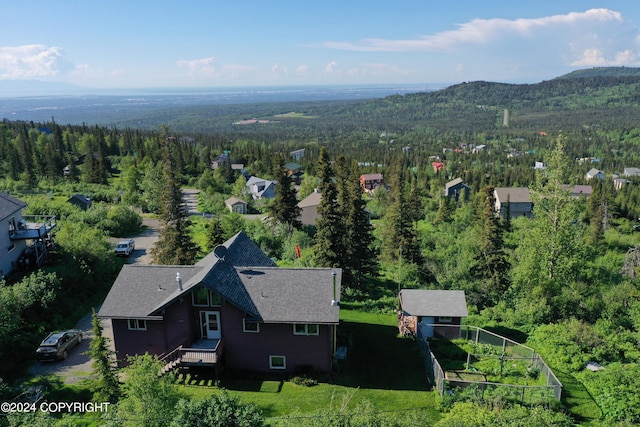 17041 Jacqueline Cir, Anchorage, AK 99516 - view from above of property featuring a forest and a mountainous background