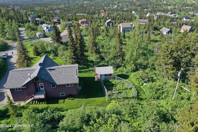 17041 Jacqueline Cir, Anchorage, AK 99516 - aerial view of property's location with a heavily wooded area