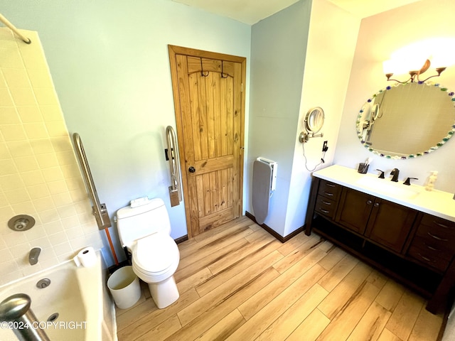 17041 Jacqueline Cir, Anchorage, AK 99516 - full bath with wood finished floors, toilet, vanity, and bathtub / shower combination