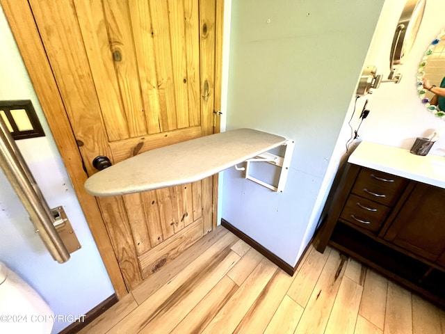 17041 Jacqueline Cir, Anchorage, AK 99516 - bathroom featuring wood finished floors and vanity