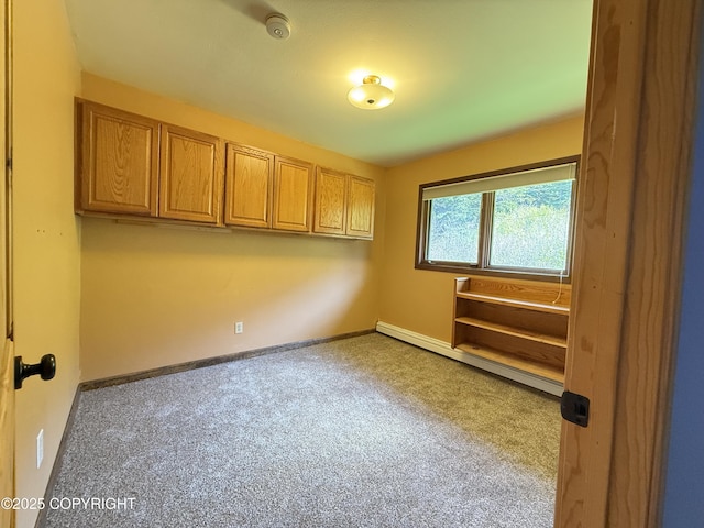17041 Jacqueline Cir, Anchorage, AK 99516 - carpeted spare room with a baseboard heating unit