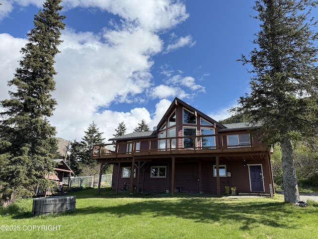 17041 Jacqueline Cir, Anchorage, AK 99516 - back of house with a deck and a yard