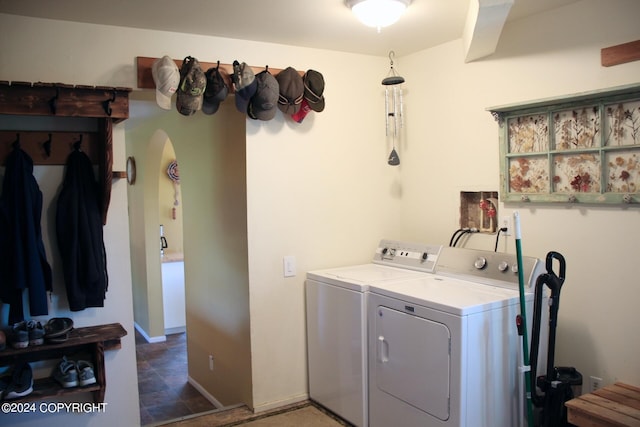 washroom featuring washing machine and dryer