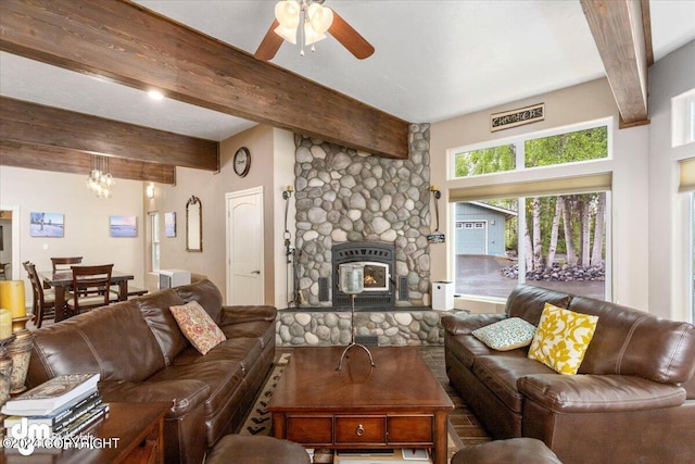 living room featuring beam ceiling and ceiling fan with notable chandelier