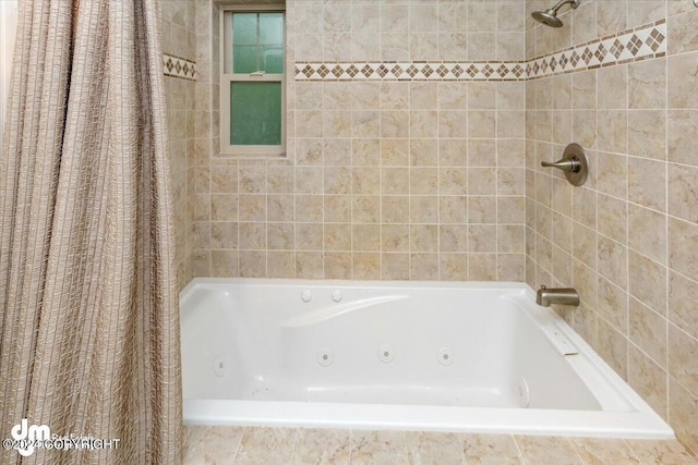 bathroom with shower / tub combo with curtain