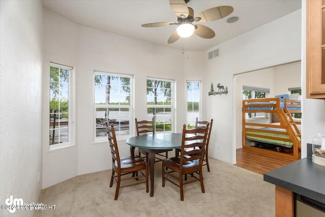 dining room featuring ceiling fan