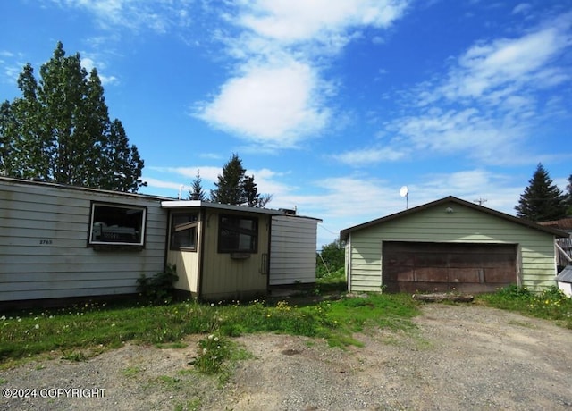 exterior space featuring a garage