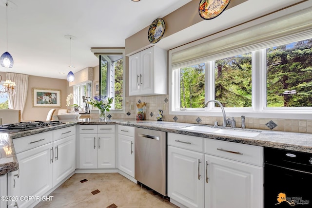 18706 Petrel Cir, Anchorage, AK 99516 - kitchen with appliances with stainless steel finishes, a sink, and healthy amount of natural light