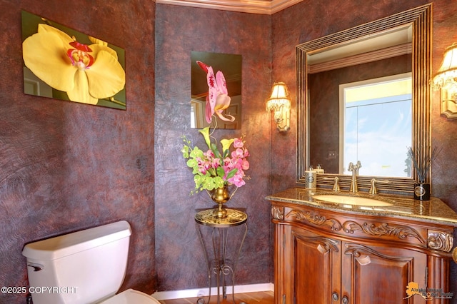 18706 Petrel Cir, Anchorage, AK 99516 - half bathroom with toilet, vanity, and ornamental molding