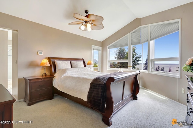 18706 Petrel Cir, Anchorage, AK 99516 - carpeted bedroom featuring baseboards, vaulted ceiling, and ceiling fan